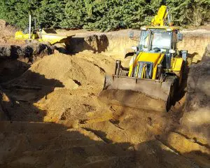 Digger excavating a basement for a new build property