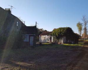 Clear space next to building project