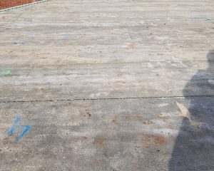 Hollowcore plank floor spanning a basement cavity